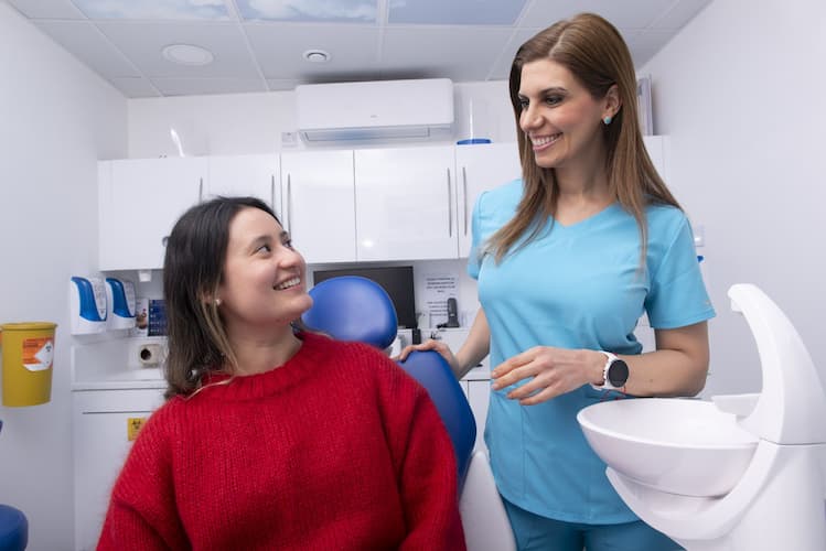 Patient and dentist during an Invisalign consultation at Blue Pearl Dental Care in London